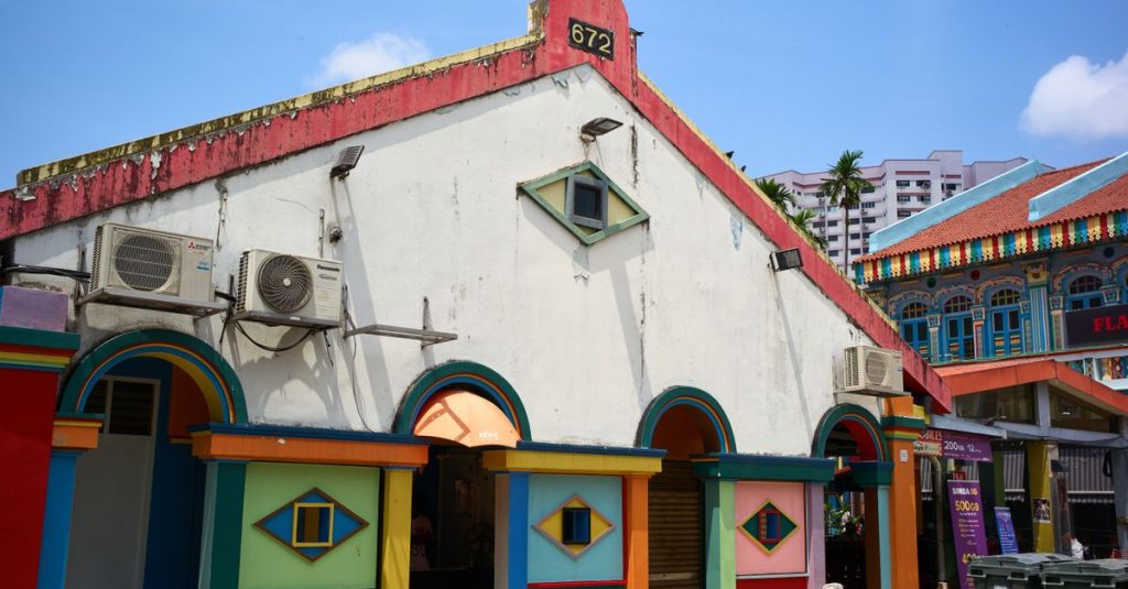 Maison aux façades colorées dans un quartier de Singapour